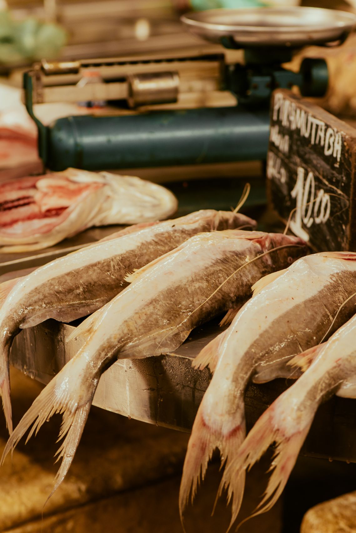 Fishmonger serving customers